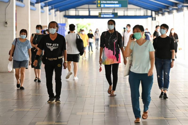 Thủ tướng Lý Hiển Long nhắn thông điệp quan trọng về sống chung với COVID-19. Ảnh: THE STRAITS TIMES