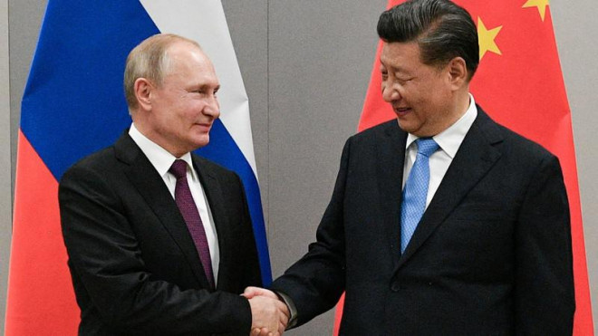 Tổng thống Nga Vladimir Putin có cuộc gặp với chủ tịch nước Trung Quốc Tập Cận Bình tại hội nghị thượng đỉnh BRICS 2019 ở Brazil. Ảnh: REUTERS&nbsp;