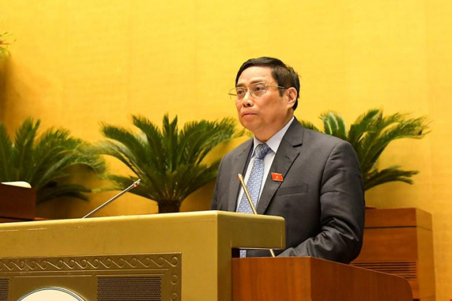 Thủ tướng Phạm Minh Chính báo cáo kết quả thực hiện kế hoạch phát triển kinh tế-xã hội và công tác phòng, chống dịch Covid-19