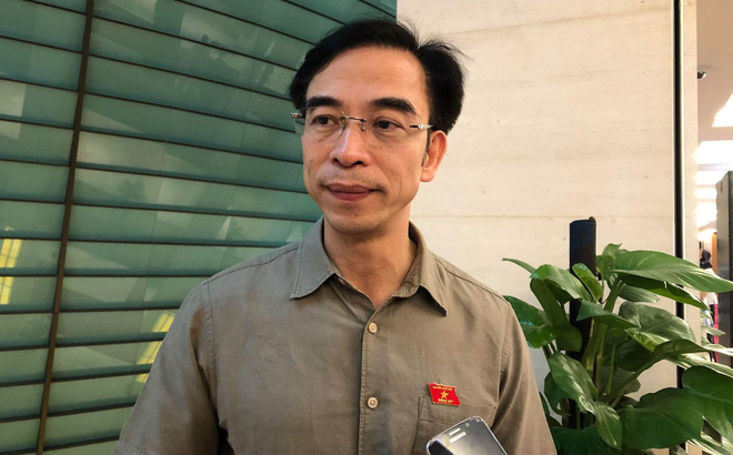 Ông Nguyễn Quang Tuấn trong một lần trả lời phỏng vấn tại Quốc hội