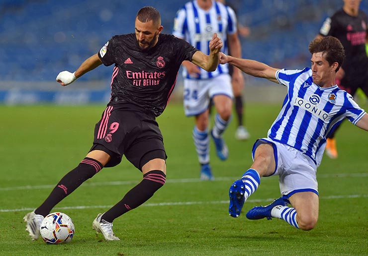 Benzema (trái) đang đạt phong độ rất cao