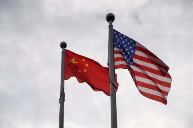 Mỹ và Trung Quốc là 2 quốc gia có tầm ảnh hưởng hàng đầu tại châu Á năm 2021. Ảnh - Reuters