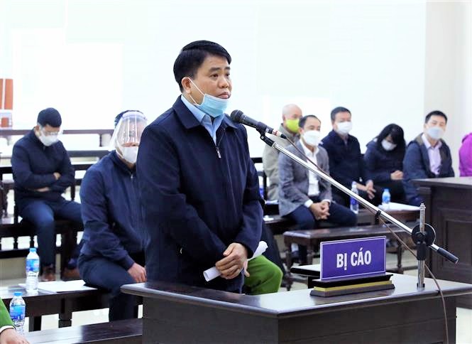 Bị cáo Nguyễn Đức Chung tại phiên xét xử. Ảnh TTX.