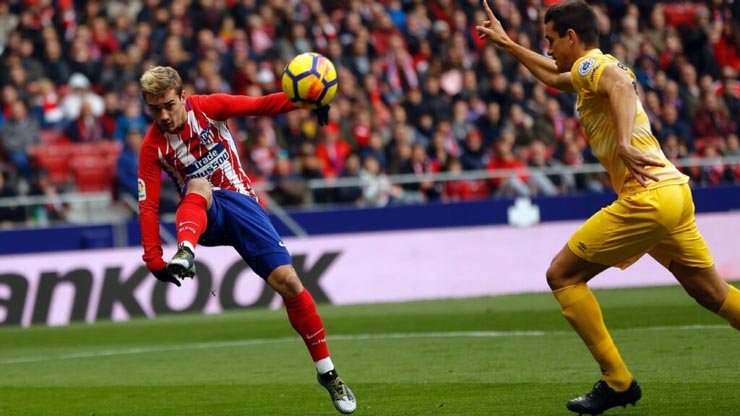 Griezmann (trái) góp công vào chiến thắng của Atletico