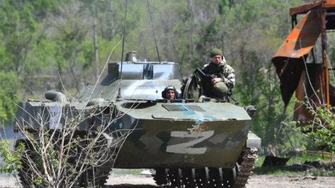 Binh sĩ và thiết giáp hạng nhẹ của Nga hoạt động ở Ukraine. Ảnh: GettyImages