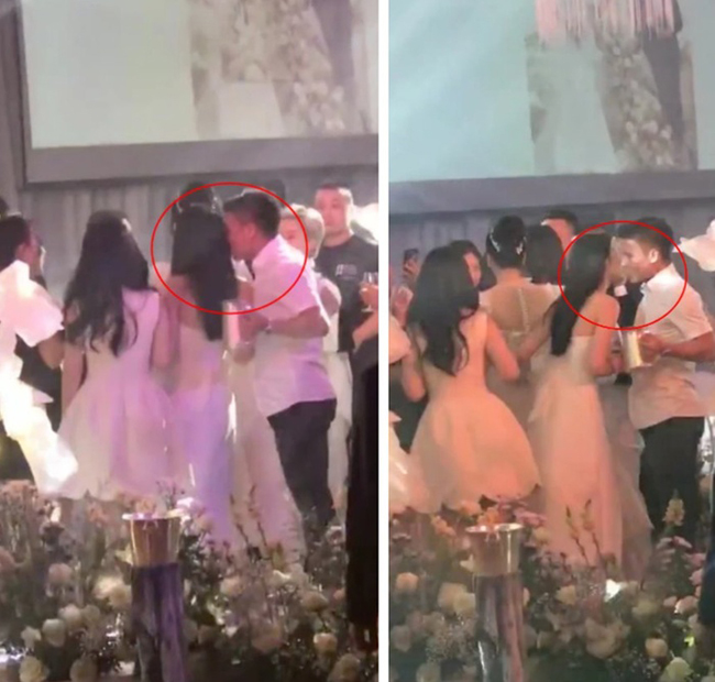 Quang Hải thể hiện hình ảnh rất ngọt ngào với bạn gái nhưng bị lọt vào ống kính chụp hình khi cả hai đi dự tiệc cưới.

