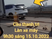 Ô tô - Clip: Ô tô đi vào làn xe máy trên cầu Thanh Trì được CSGT &quot;hộ tống&quot; và cái kết