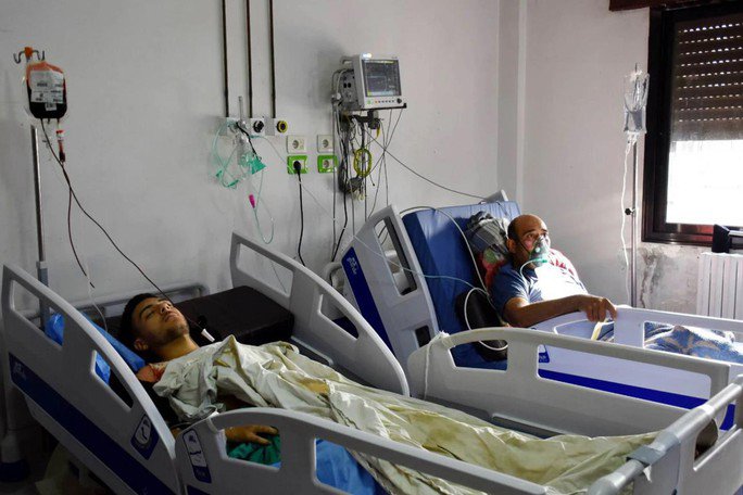 Các quân nhân bị thương trong cuộc tấn công hôm 5-10 đang được điều trị tại bệnh viện - Ảnh: SANA