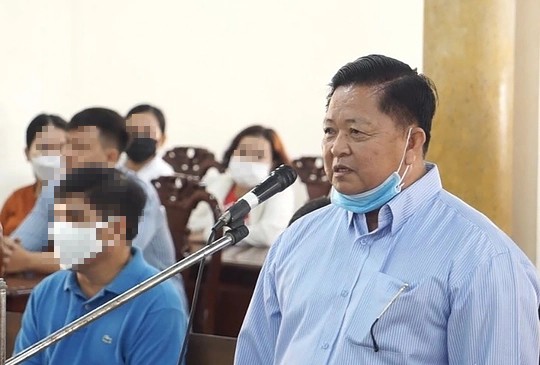 Cấp biển số xe sai quy định, cựu trưởng Phòng CSGT An Giang lãnh 2 năm tù - 2