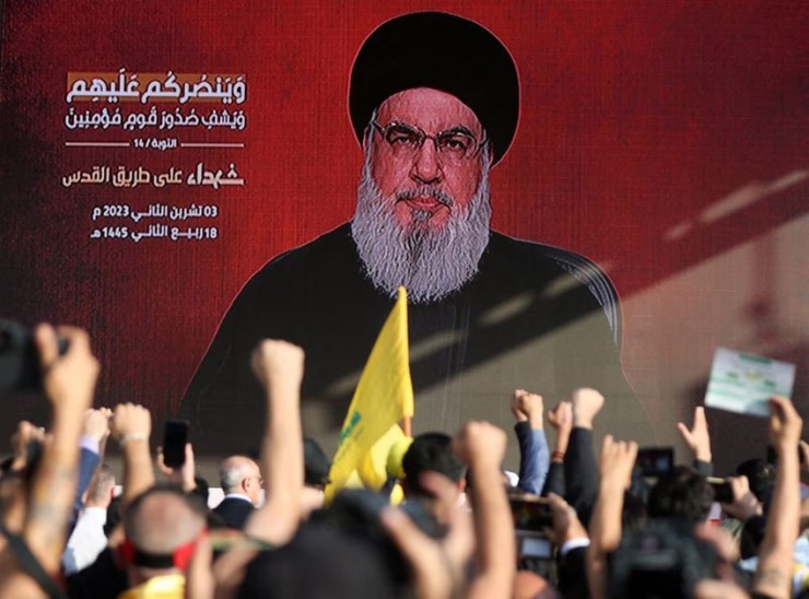 Lãnh đạo nhóm Hồi giáo vũ trang Hezbollah (Lebanon) - ông Sayyed Hassan Nasrallah phát biểu trên truyền hình hôm 3-11. Ảnh: REUTERS