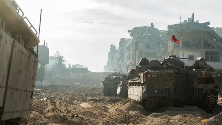 Xe quân sự Israel hoạt động ở Dải Gaza hôm 18/11.