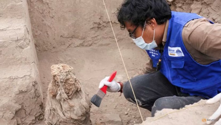 Khai quật 4 xác ướp trẻ em có niên đại 1.000 năm tuổi, còn nguyên tóc trên hộp sọ - 2