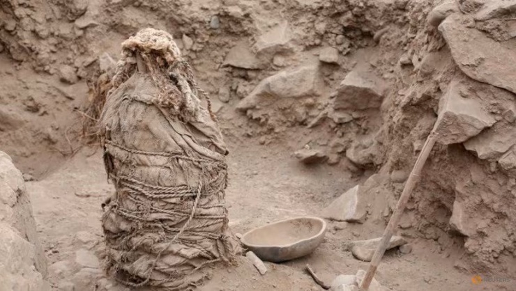 Khai quật 4 xác ướp trẻ em có niên đại 1.000 năm tuổi, còn nguyên tóc trên hộp sọ - 1