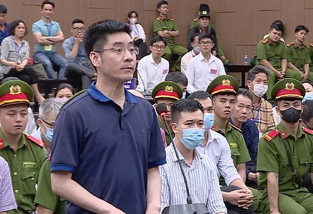 Bị cáo Hoàng Văn Hưng tại phiên xét xử sơ thẩm vụ án "chuyến bay giải cứu" . Ảnh: Thành Nguyễn