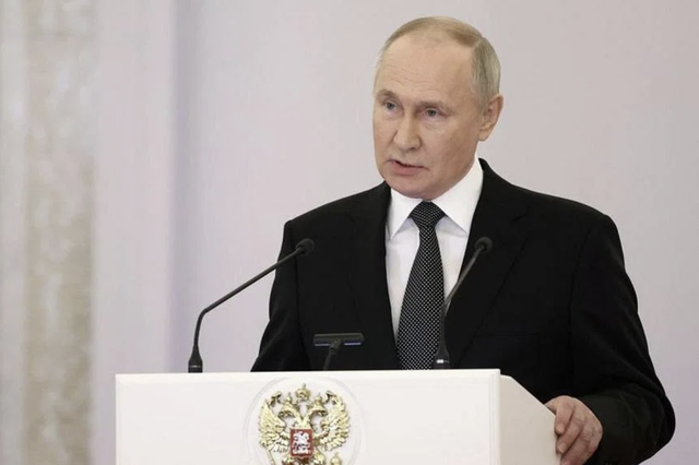 Tổng thống Putin xác nhận tái tranh cử trong bài phát biểu ngày 8-12. Ảnh: Reuters