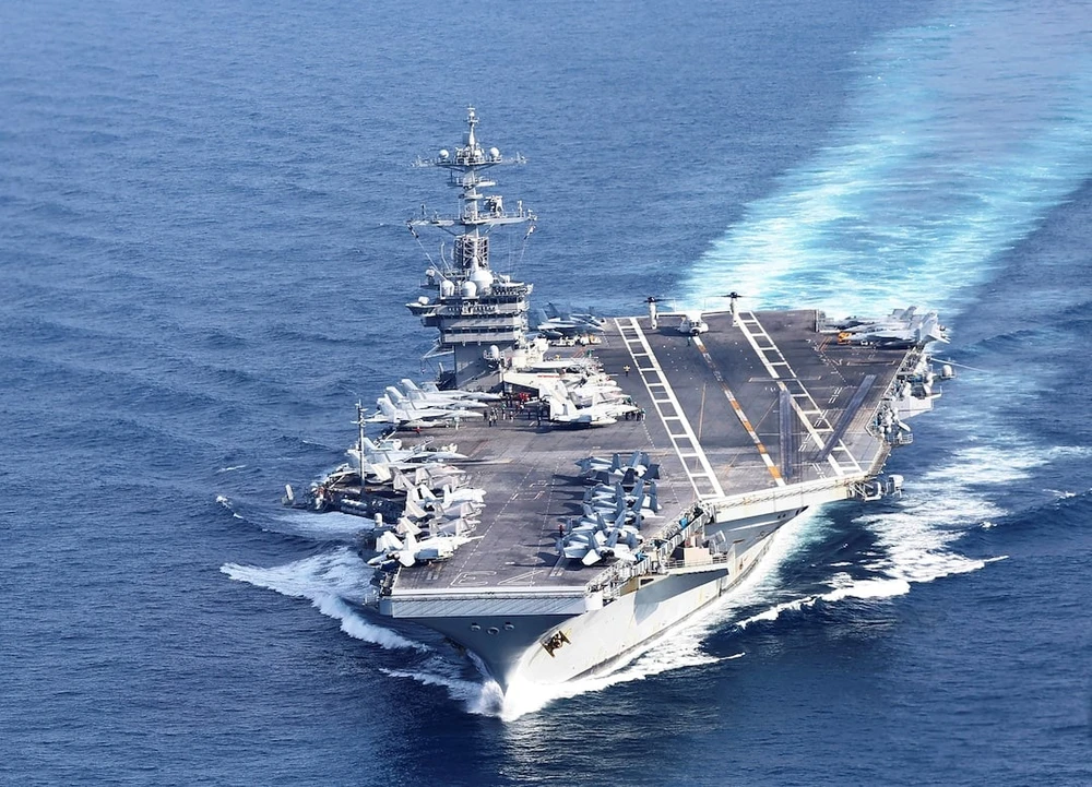 Tàu sân bay USS George Washington của Hải quân Mỹ trong cuộc tập trận ba bên Freedom Edge hôm 14-11. Ảnh: REUTERS