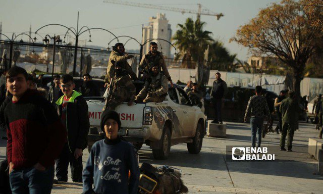 Quân nổi dậy ở TP Aleppo - Ảnh: ENAB BALADI