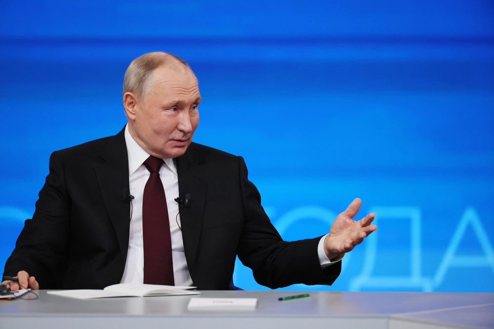 Tổng thống Nga Vladimir Putin trong cuộc họp báo tổng kết cuối năm diễn ra ngày 19-12. Ảnh: RIA NOVOSTI