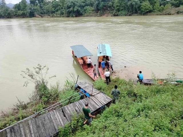 Công an tiến hành tìm thi thể nạn nhân T (ảnh tư liệu)