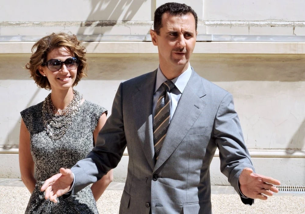 Tổng thống Syria bị lật đổ Bashar al-Assad và phu nhân Asma al-Assad. Ảnh: AFP